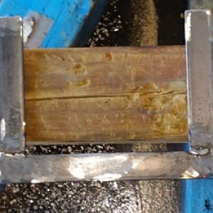 on a flat surface weld both sides of all plates then grind them smooth.