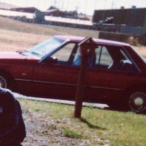 My first car was red and a Ford, so I was already hooked. This was an 85 Fairmont lowered with a 4 inch grinder!