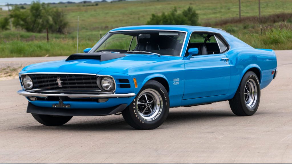 1970-Ford-Mustang-Boss-429-exterior-003-Mecum-Auctions-Grabber-Blue-front-driver-three-quarter...jpg