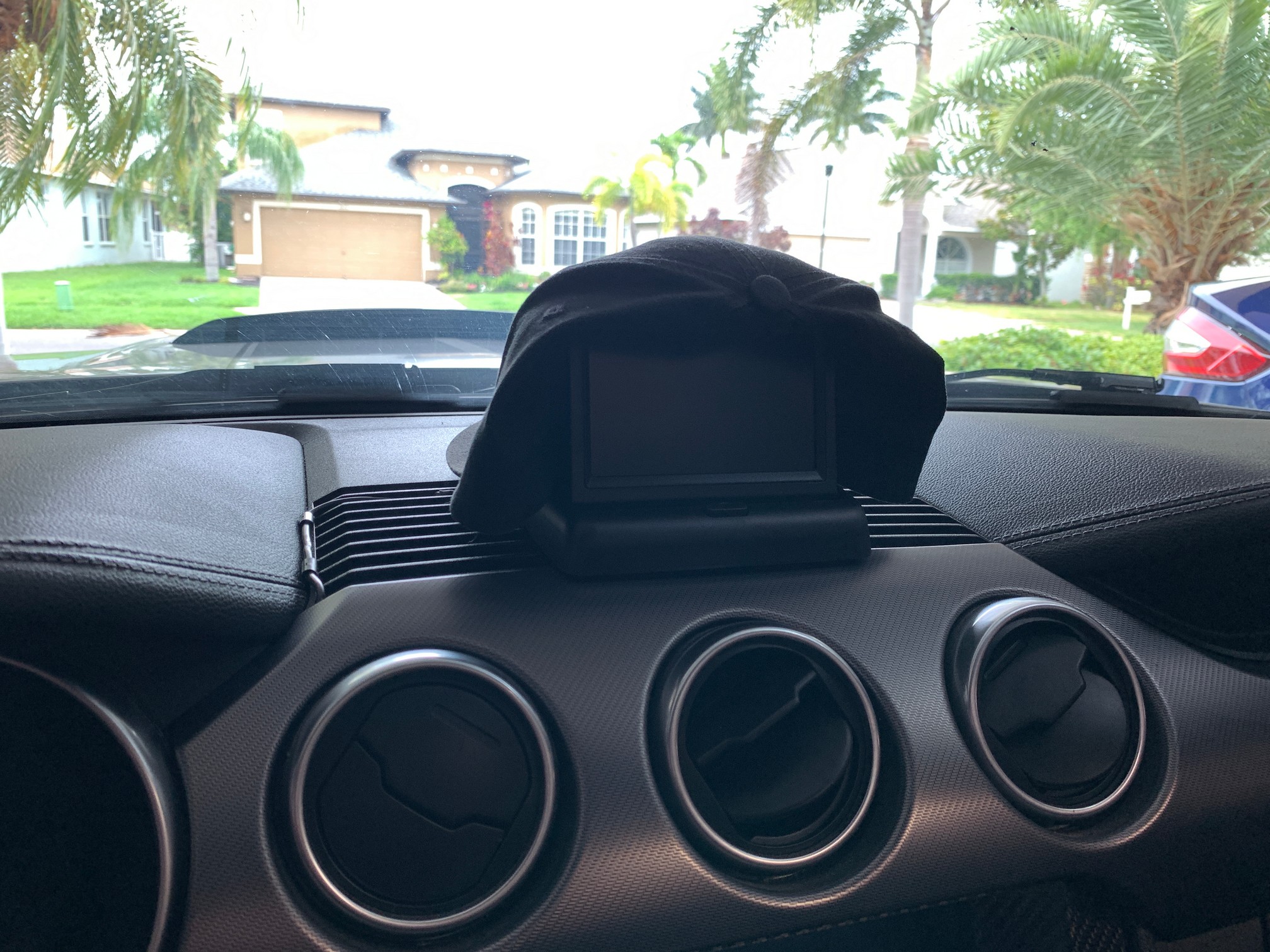 Dash Monitor with Mustang Hat protecting from Direct Sun.jpg