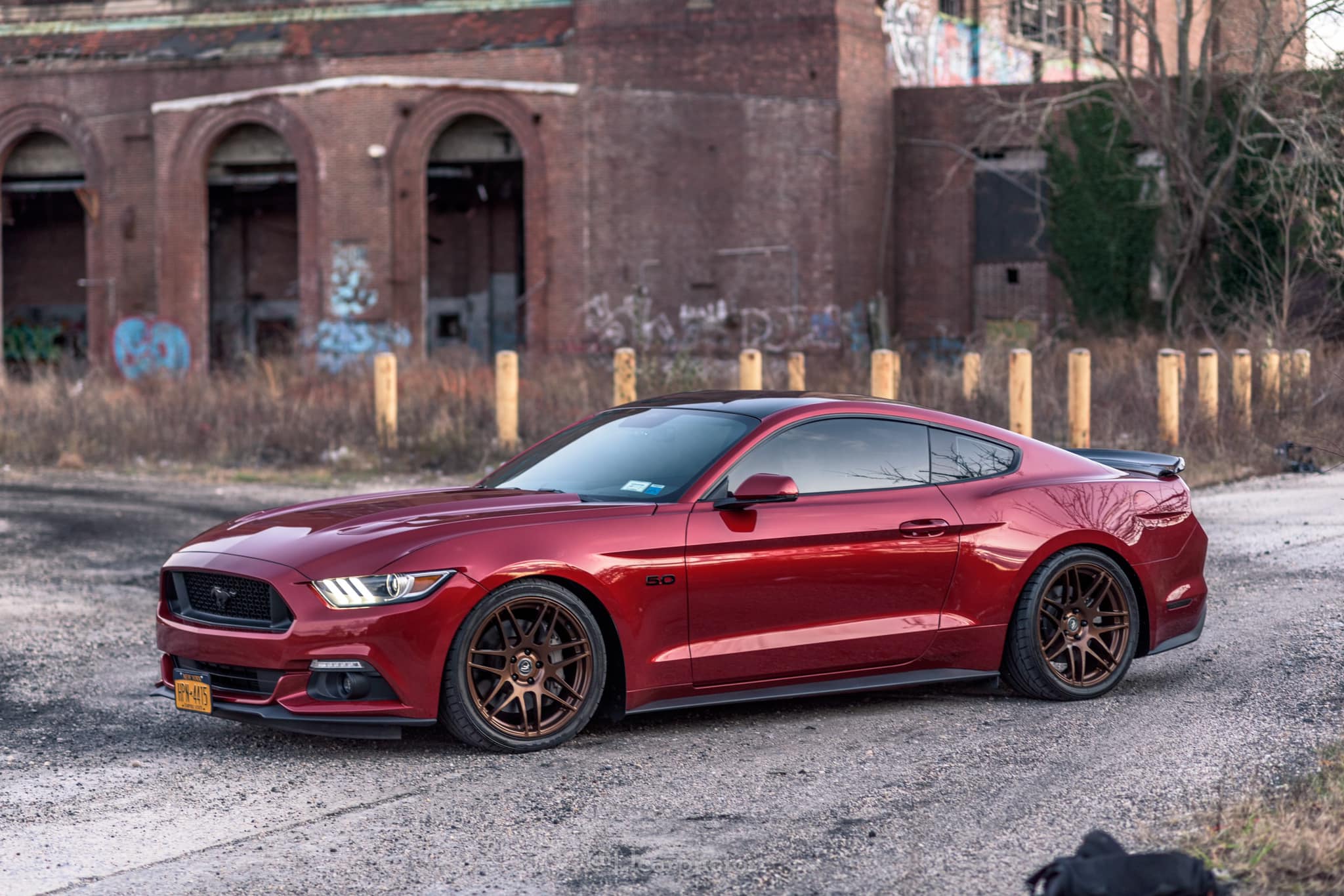 ruby-red-s550-mustang-gt-with-super-rootbeer-bronze-forgestar-f14-wheels-1.jpg