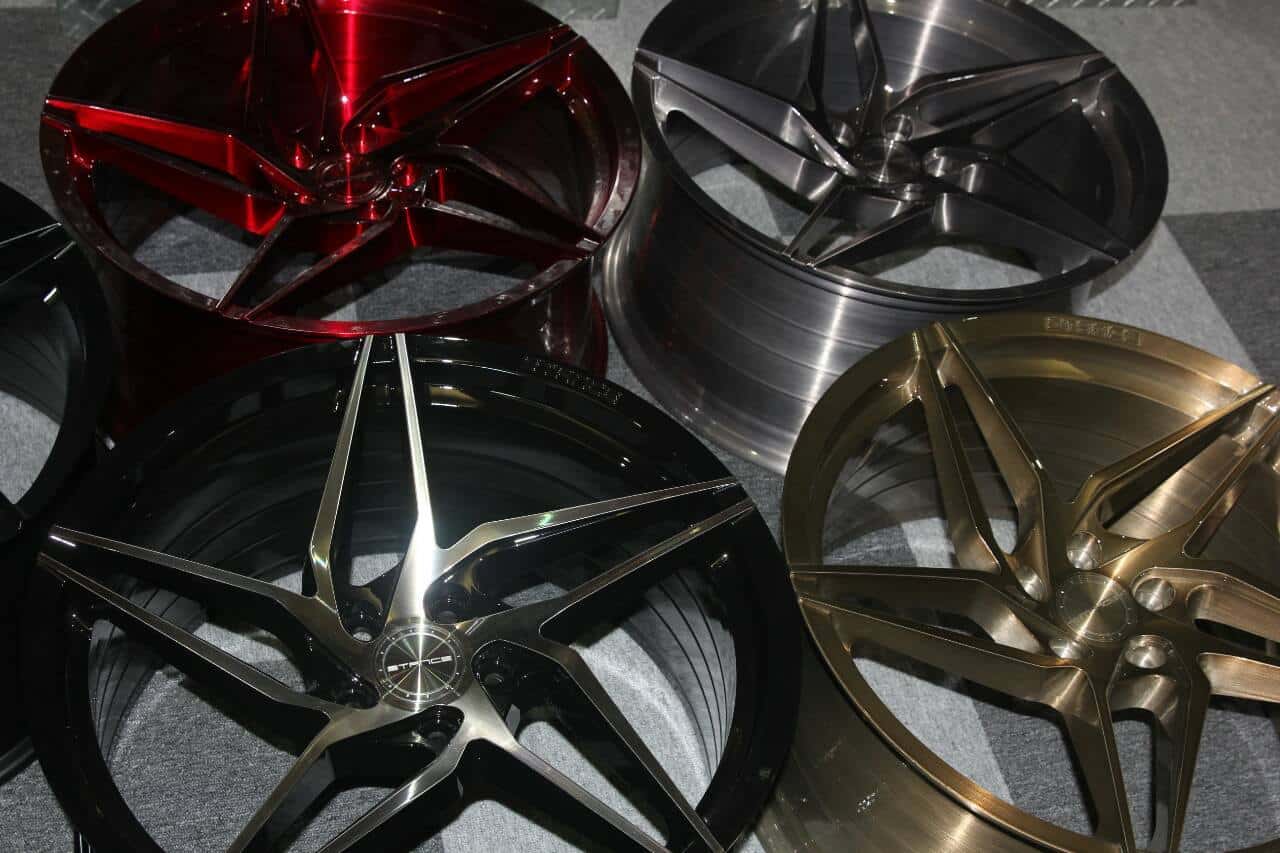 rushed-bronze-brushed-titanium-machined-black-brushed-candy-red-directional-rotory-forged-wheels.jpg
