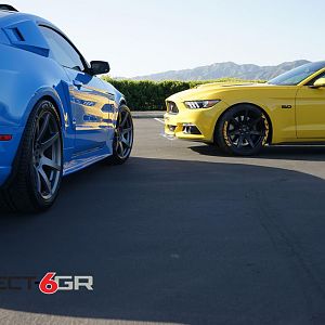 S550 and S197 Mustangs sitting on Project 6GR wheels