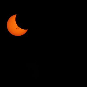 Partial solar eclipse, 10/23/2014. Shot through 80mm refractor telescope with a Canon 600D using a white-light solar filter.
