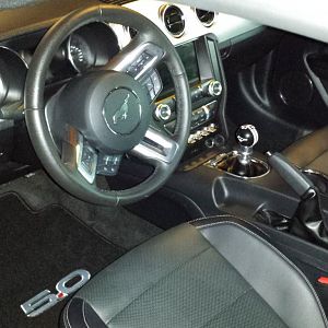 Black Mustang GT Premium:
Manual, Eibach Sportline Springs, Velgen VMB7 Wheels, Nitto Invo Tires, Bassani 3" Catback Exhaust, Steeda CAI