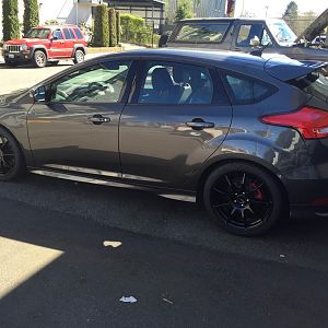 2015 Focus ST - Magnetic 
ST3 package w/Mountune Short Shift Kit, Enkei TS9 wheels w/Michelin PSS, Upgraded pads. 

Named "Little Rhino"