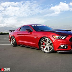 Project 6gr wheels on a Ruby Red Ford Mustang GT Front Side 2 View