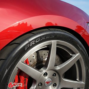 Project 6gr wheels on a Ruby Red Ford Mustang GT Front Close wheel View