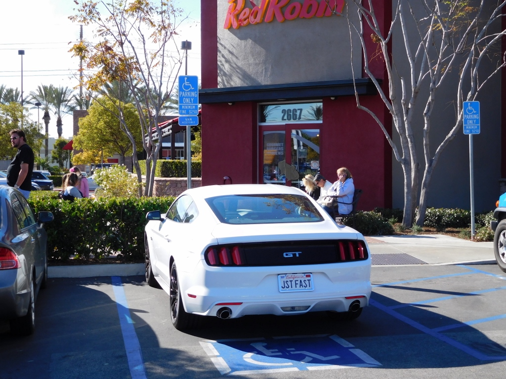 JST FAST parked in front of the Red Robin where Jane and I enjoyed a great burger after the Tour.  That's Jane sitting on the bench in the background;